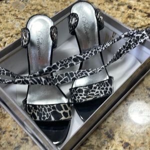 Never worn black and white tie up the ankle heels